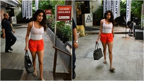 Talking about gym fashion and not mention Janhvi Kapoor is not possible. The actress's bright coloured shorts and a white tank top with a neon coloured sports bra is stealing all the attention. Janhvi with her perfectly toned body and chic gym fashion is giving some major workout vibes.&nbsp;(HT Photos/Varinder Chawla)