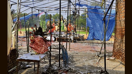 File photo: Charred remains of a Durga Puja pandal after a fire broke out during in Bhadohi (PTI)