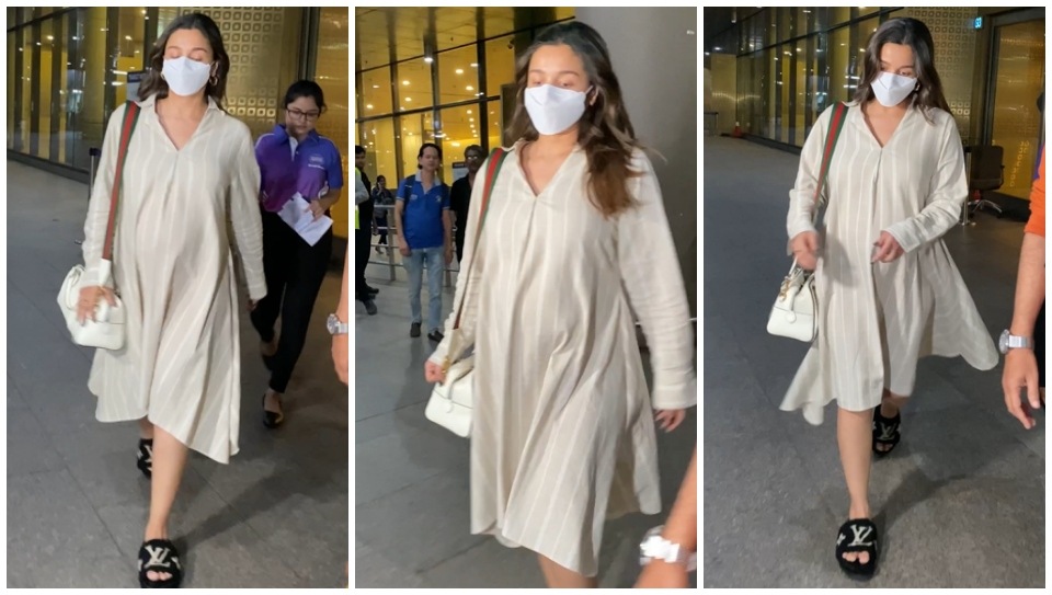 Alia Bhatt dons a loose striped dress for airport look.&nbsp;(HT Photo/Varinder Chawla)