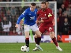 Rangers' John Lundstram, left, and Liverpool's Jordan Henderson challenge for the ball during the Champions League Group A soccer match between Liverpool and Rangers at Anfield stadium in Liverpool, England, (AP) Rangers' John Lundstram, left, and Liverpool's Jordan Henderson challenge for the ball during the Champions League Group A soccer match between Liverpool and Rangers at Anfield stadium in Liverpool, England, (AP)