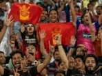 RCB fans cheer during IPL match. RCB fans cheer during IPL match.