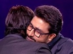 Amitabh Bachchan with Abhishek Bachchan on KBC 14. Amitabh Bachchan with Abhishek Bachchan on KBC 14.
