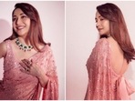 Madhuri Dixit stuns in a ‘Gulabi’ sequin saree she wore for Jhalak Dikhhla Jaa 10. (Instagram) Madhuri Dixit stuns in a ‘Gulabi’ sequin saree she wore for Jhalak Dikhhla Jaa 10. (Instagram)