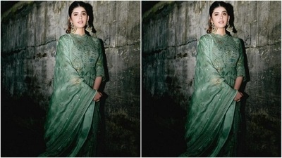 Sanjana looked every bit gorgeous in pastel green long gown embroidered in silver mirror work. She added a pastel green dupatta featuring minimal patterns in silver mirror work and silver zari at the borders. (Instagram/@sanjanasanghi96) Sanjana looked every bit gorgeous in pastel green long gown embroidered in silver mirror work. She added a pastel green dupatta featuring minimal patterns in silver mirror work and silver zari at the borders. (Instagram/@sanjanasanghi96)