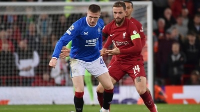 Rangers' John Lundstram, left, and Liverpool's Jordan Henderson challenge for the ball during the Champions League Group A soccer match between Liverpool and Rangers at Anfield stadium in Liverpool, England, (AP) Rangers' John Lundstram, left, and Liverpool's Jordan Henderson challenge for the ball during the Champions League Group A soccer match between Liverpool and Rangers at Anfield stadium in Liverpool, England, (AP)