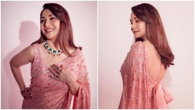 Madhuri Dixit stuns in a ‘Gulabi’ sequin saree she wore for Jhalak Dikhhla Jaa 10. (Instagram) Madhuri Dixit stuns in a ‘Gulabi’ sequin saree she wore for Jhalak Dikhhla Jaa 10. (Instagram)
