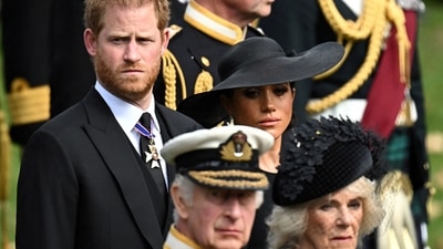 Britain's Meghan, Duchess of Sussex, Prince Harry, Duke of Sussex, Queen Camilla and King Charles III attend the state funeral of Britain's Queen Elizabeth II.