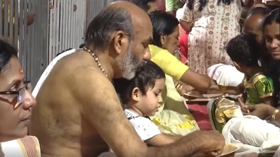 Vidyarambham ceremony being done at Dakshina Mookambika Temple in Ernakulam district of Kerala. It is a religious celebration in Hindu tradition to introduce young children to the world of knowledge and the process of learning, usually conducted on Vijayadashmi. (ANI)