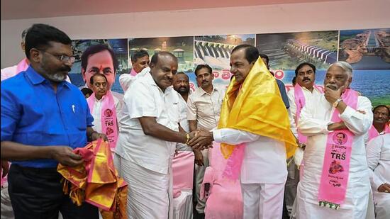 TRS president and Telangana CM K Chandrashekar with VCK party founder Thol. Thirumavalavan and JDS leader H. D. Kumaraswamy during changing of the name of the party from Telangana Rashtra Samithi (TRS) to Bharat Rashtra Samithi (BRS). (PTI) TRS president and Telangana CM K Chandrashekar with VCK party founder Thol. Thirumavalavan and JDS leader H. D. Kumaraswamy during changing of the name of the party from Telangana Rashtra Samithi (TRS) to Bharat Rashtra Samithi (BRS). (PTI)
