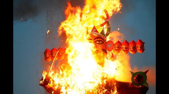 An 80-foot-tall effigy of Ravana’s son Meghnad was up in flames at the Sector 46 ground in Chandigarh when four youngsters managed to direct a rocket cracker towards it at 12.40 am. (Ravi Kumar/HT)