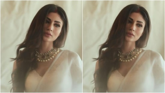 Mouni opted for a white chiffon saree with patchwork in ivory white threads.(Instagram/@imouniroy)