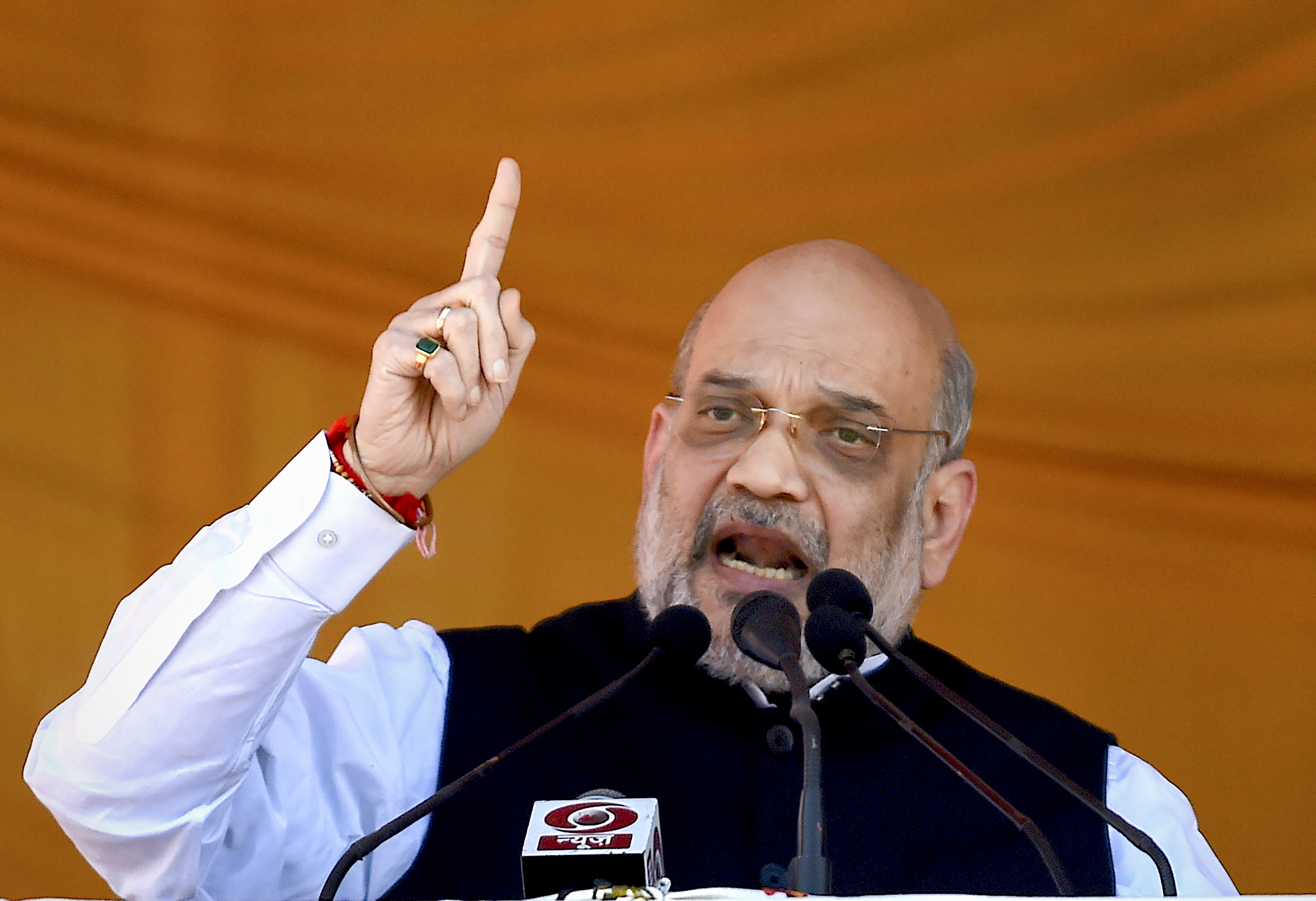 Union Home Minister Amit Shah addresses a public rally, at the Showkat Ali Stadium in Baramulla district of north Kashmir. (PTI) Union Home Minister Amit Shah addresses a public rally, at the Showkat Ali Stadium in Baramulla district of north Kashmir. (PTI)
