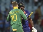 Sanju Samson greets David Miller after South Africa won the first ODI by 9 runs in Lucknow(AP)