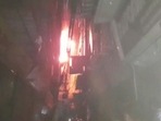 Reports indicate that the fire began at the shop in Nehru Lane where most garments and hosiery outlets are located.(ANI) Reports indicate that the fire began at the shop in Nehru Lane where most garments and hosiery outlets are located.(ANI)