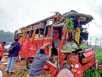 Locals at the site of the accident after a collision between a private tourist bus and a Kerala State Road Transport Corporation (KSRTC) bus on Wednesday night, at Vadakkenchery in Palakkad district, Thursday, October 6, 2022. (PTI Photo) Locals at the site of the accident after a collision between a private tourist bus and a Kerala State Road Transport Corporation (KSRTC) bus on Wednesday night, at Vadakkenchery in Palakkad district, Thursday, October 6, 2022. (PTI Photo)