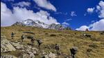 Army personnel move towards the avalanche site to carry out rescue operations in Uttarkashi district on Thursday. (PTI) Army personnel move towards the avalanche site to carry out rescue operations in Uttarkashi district on Thursday. (PTI)