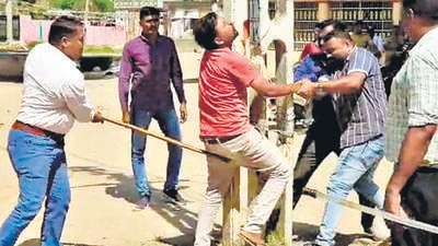 In the purported clip that went viral on social media, around five Gujarat policemen are seen flogging four to five men. In the purported clip that went viral on social media, around five Gujarat policemen are seen flogging four to five men.