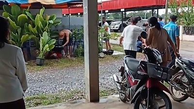 Thailand Daycare Centre Shooting: A distraught woman is comforted outside the site of an attack at a daycare center,&nbsp; (AP)