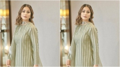 Hina further teamed her salwar with a pair of moss green sharara with silver zari work at the ankles and wide legs. In a moss green dupatta with silver frill details at the borders, she completed her look for the day. (Instagram/@realhinakhan) Hina further teamed her salwar with a pair of moss green sharara with silver zari work at the ankles and wide legs. In a moss green dupatta with silver frill details at the borders, she completed her look for the day. (Instagram/@realhinakhan)