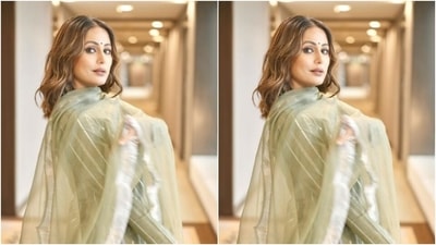 In minimal makeup, Hina complemented her attire. The actor decked up in nude eyeshadow, black eyeliner, black kohl, mascara-laden eyelashes, drawn eyebrows, contoured cheeks, a shade of nude lipstick and a small black bindi, Hina looked festive-ready. (Instagram/@realhinakhan) In minimal makeup, Hina complemented her attire. The actor decked up in nude eyeshadow, black eyeliner, black kohl, mascara-laden eyelashes, drawn eyebrows, contoured cheeks, a shade of nude lipstick and a small black bindi, Hina looked festive-ready. (Instagram/@realhinakhan)
