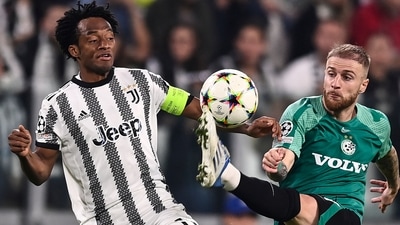 Juventus' Juan Cuadrado, left, and Maccabi Haifa's Pierre Cornud in action during the Champions League soccer match between Juventus FC and Maccabi Haifa (AP) Juventus' Juan Cuadrado, left, and Maccabi Haifa's Pierre Cornud in action during the Champions League soccer match between Juventus FC and Maccabi Haifa (AP)