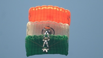 Team Akash Ganga demonstrates paragliding skills in full-dress rehearsal for Indian Air force Day celebration in Chandigarh. (Photo by Ravi Kumar/ HT Photo) 