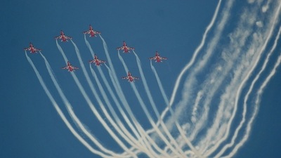 Team Surya Kiran of the Indian Air force perform aerobatic skills in full-dress rehearsal of the 90th Indian Air force Day celebration. (Ravi Kumar/ HT Photo) 
