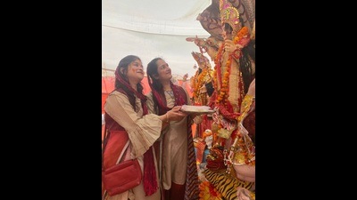 At Tulsiani Golf View apartment, women wore traditional white & red sarees to offer sindoor to goddess Durga before the immersion (ht) At Tulsiani Golf View apartment, women wore traditional white & red sarees to offer sindoor to goddess Durga before the immersion (ht)