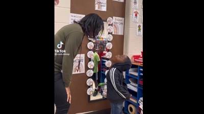 A kid does his daily affirmation with his teacher. (Instagram/@josephrobertshq) A kid does his daily affirmation with his teacher. (Instagram/@josephrobertshq)