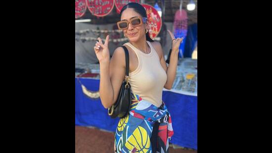 Mrunal Thakur chose a beige fitted vest top for her vacation style (Photo: Instagram)