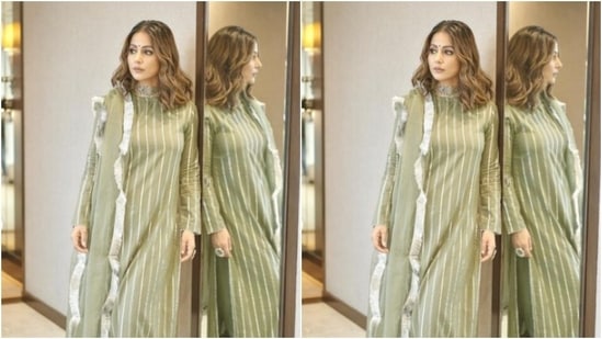 Hina wore her shoulder-length tresses open in soft wavy curls with a side part as she posed for the pictures.(Instagram/@realhinakhan)