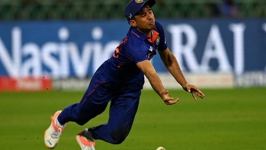 Ravi Bishnoi dives to catch the ball during the first ODI between India and South Africa in Lucknow(AFP)
