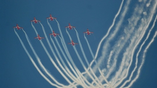 Team Surya Kiran of the Indian Air force perform aerobatic skills in full-dress rehearsal of the 90th Indian Air force Day celebration. (Ravi Kumar/ HT Photo)