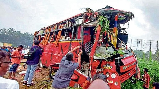 Locals at the site of the accident after a collision between a private tourist bus and a Kerala State Road Transport Corporation (KSRTC) bus on Wednesday night, at Vadakkenchery in Palakkad district, Thursday, October 6, 2022. (PTI Photo)