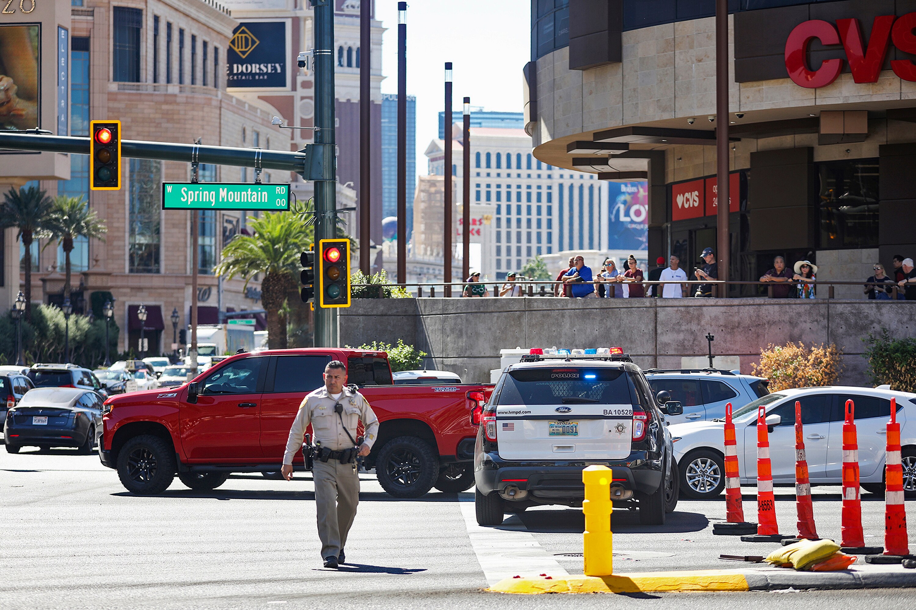 Police work at the scene where multiple people were stabbed in front of a Strip casino in Las Vegas, Thursday, October 6, 2022. (Rachel Aston/Las Vegas Review-Journal via AP)