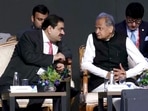 Rajasthan chief minister Ashok Gehlot interacts with Adani Group chairman Gautam Adani at the two-day Invest Rajasthan Summit 2022 in Jaipur on Friday.&nbsp;(ANI)
