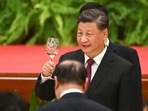 Xi Jinping: Chinese President Xi Jinping raises a glass during a reception in Beijing. Xi Jinping: Chinese President Xi Jinping raises a glass during a reception in Beijing.