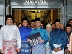 Malaysia's Finance Minister Tengku Zafrul holds a bag containing the 2023 budget at Finance Ministry building as he departs to the Parliament, in Putrajaya, Malaysia, October 7.