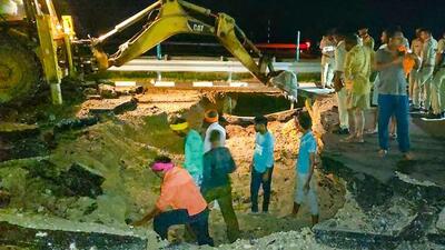 Restoration work underway on a portion of the Purvanchal Expressway that caved in on Thursday night in Sultanpur district. (PTI PHOTO)