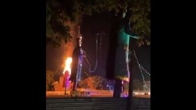 A police official said the trio was inebriated when they directed a rocket cracker at the effigy and set fire to it “just for fun”. They had fled the spot in an SUV, which has been impounded. (HT Photo)