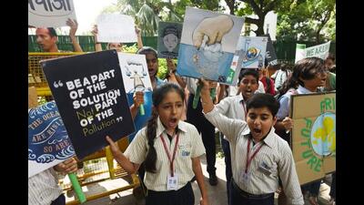 School students gather with placards while raising slogans to save the environment, September 20, 2019. (Vipin Kumar/HT PHOTO)