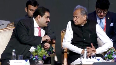 Rajasthan chief minister Ashok Gehlot interacts with Adani Group chairman Gautam Adani at the two-day Invest Rajasthan Summit 2022 in Jaipur on Friday.&nbsp; (ANI)