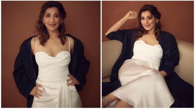Sonali Bendre has been ruling hearts of many since the 90s when she appeared in the film Hum Saath Saath Hain. Over the years, she has only been garnering praise for not just her charm but also her bold and vibrant personality. She recently left her wellwishers spellbound with her pictures in a white skirt set teamed with a black trench coat. (Instagram/@iamsonalibendre) Sonali Bendre has been ruling hearts of many since the 90s when she appeared in the film Hum Saath Saath Hain. Over the years, she has only been garnering praise for not just her charm but also her bold and vibrant personality. She recently left her wellwishers spellbound with her pictures in a white skirt set teamed with a black trench coat. (Instagram/@iamsonalibendre)