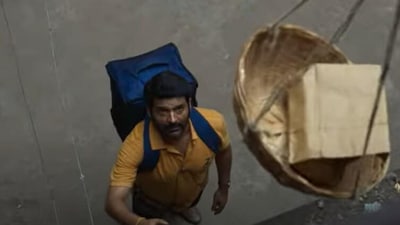Kapil Sharma as a delivery boy in a still from Zwigato trailer. Kapil Sharma as a delivery boy in a still from Zwigato trailer.