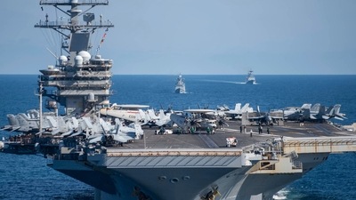 US aircraft carrier USS Ronald Reagan participates with other US and South Korean navy ships during the joint naval exercises. (AP) US aircraft carrier USS Ronald Reagan participates with other US and South Korean navy ships during the joint naval exercises. (AP)
