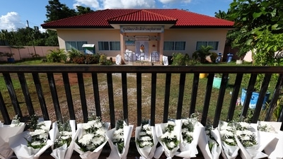 Chakkraphat Wichitvaidya, a local police official, told Reuters autopsies showed the children had been slashed with a large knife, sometimes multiple times, and adults shot. (REUTERS)