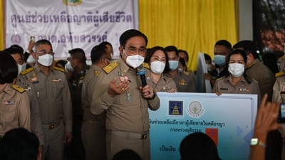 Thailand's Prime Minister Prayut Chan-O-Cha spoke to relatives of victims at a mass shooting at a nursery in Na Klang in Thailand's northeastern Nong Bua Lam Phu province on October 7. (AFP) Thailand's Prime Minister Prayut Chan-O-Cha spoke to relatives of victims at a mass shooting at a nursery in Na Klang in Thailand's northeastern Nong Bua Lam Phu province on October 7. (AFP)