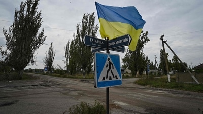 Russia-Ukraine War: Ukrainian flag waves on a street of the recently liberated village of Vysokopillya, Kherson region. (AFP)