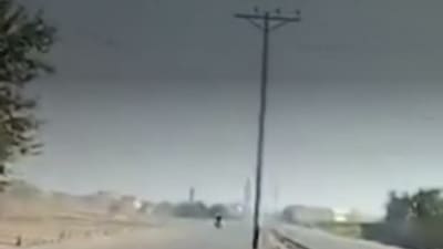 Pakistan: Electric poles installed in the middle of a road in Pakistan are seen. (Twitter) Pakistan: Electric poles installed in the middle of a road in Pakistan are seen. (Twitter)