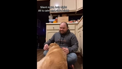 Man sings to her dog. (Instagram/@goldenretriever_biglove) Man sings to her dog. (Instagram/@goldenretriever_biglove)